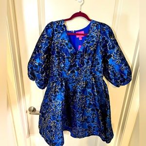 This is a women’s Lily Pulitzer dress in a size 16.